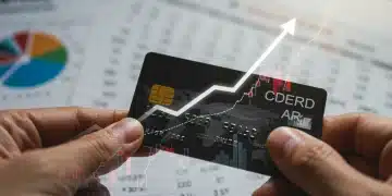 Credit card with rising interest rate graph for 2025, symbolizing financial changes