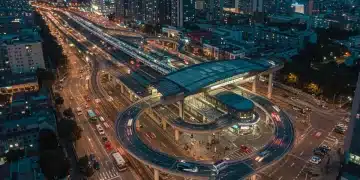 Modern public transit hub with trains and buses